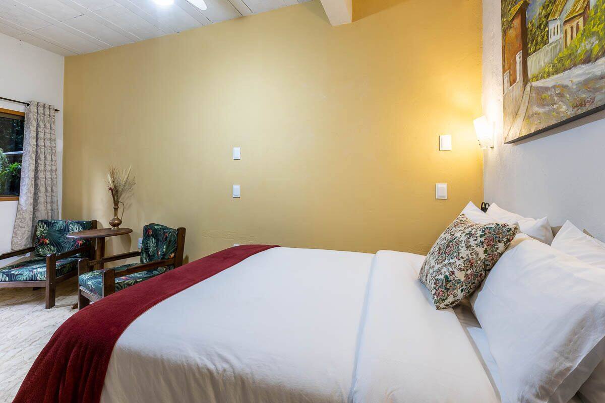 Quarto casal | Frigobar, cortinas blackout, Wi-Fi de cortesia, roupa de cama