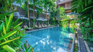 Outdoor pool, pool umbrellas, sun loungers