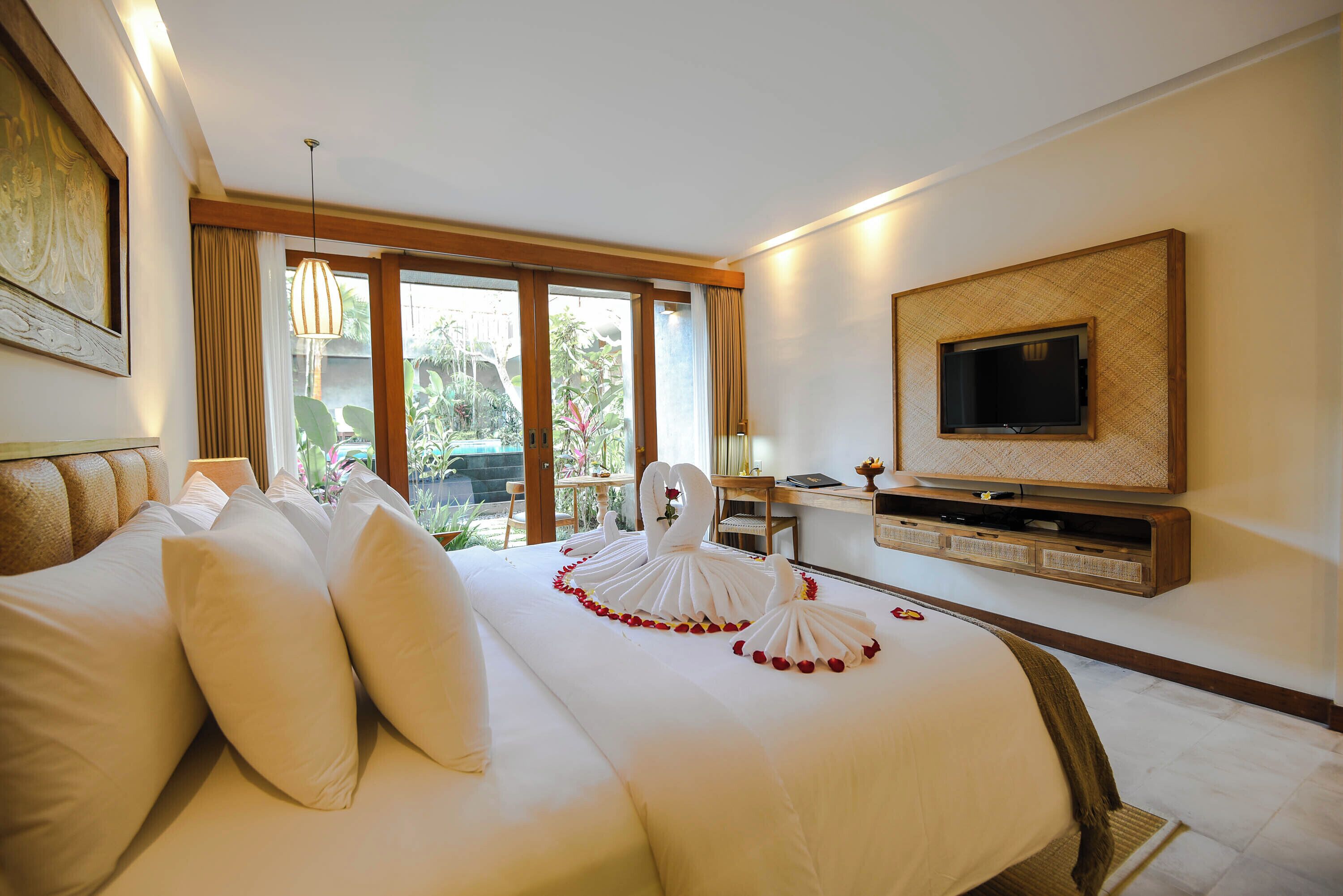 romantic suite pool access | 1 bedroom, pillow-top beds, minibar, in-room safe