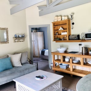 Suite Comfort | Area soggiorno | TV