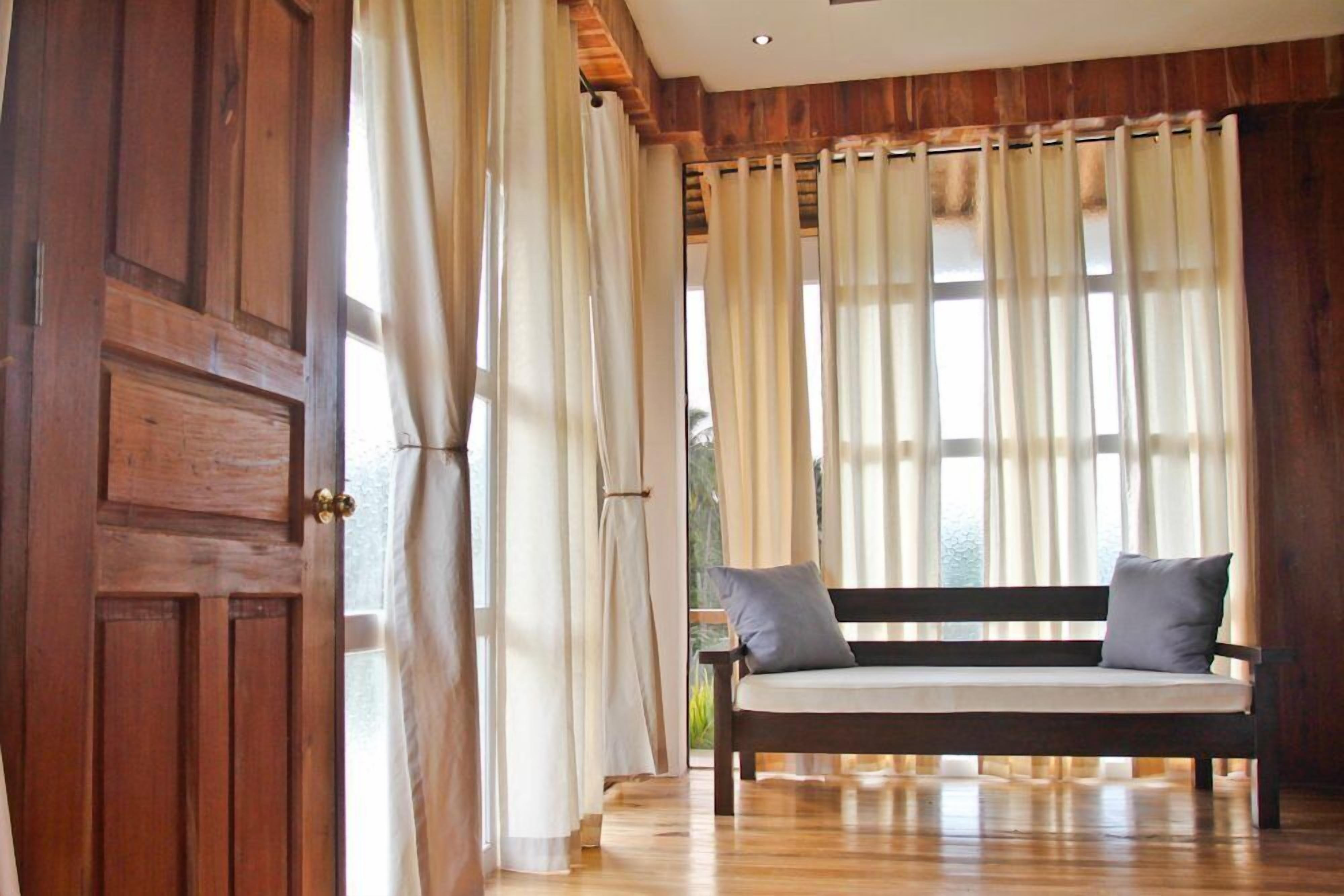 deluxe villa | living room | flat-screen tv