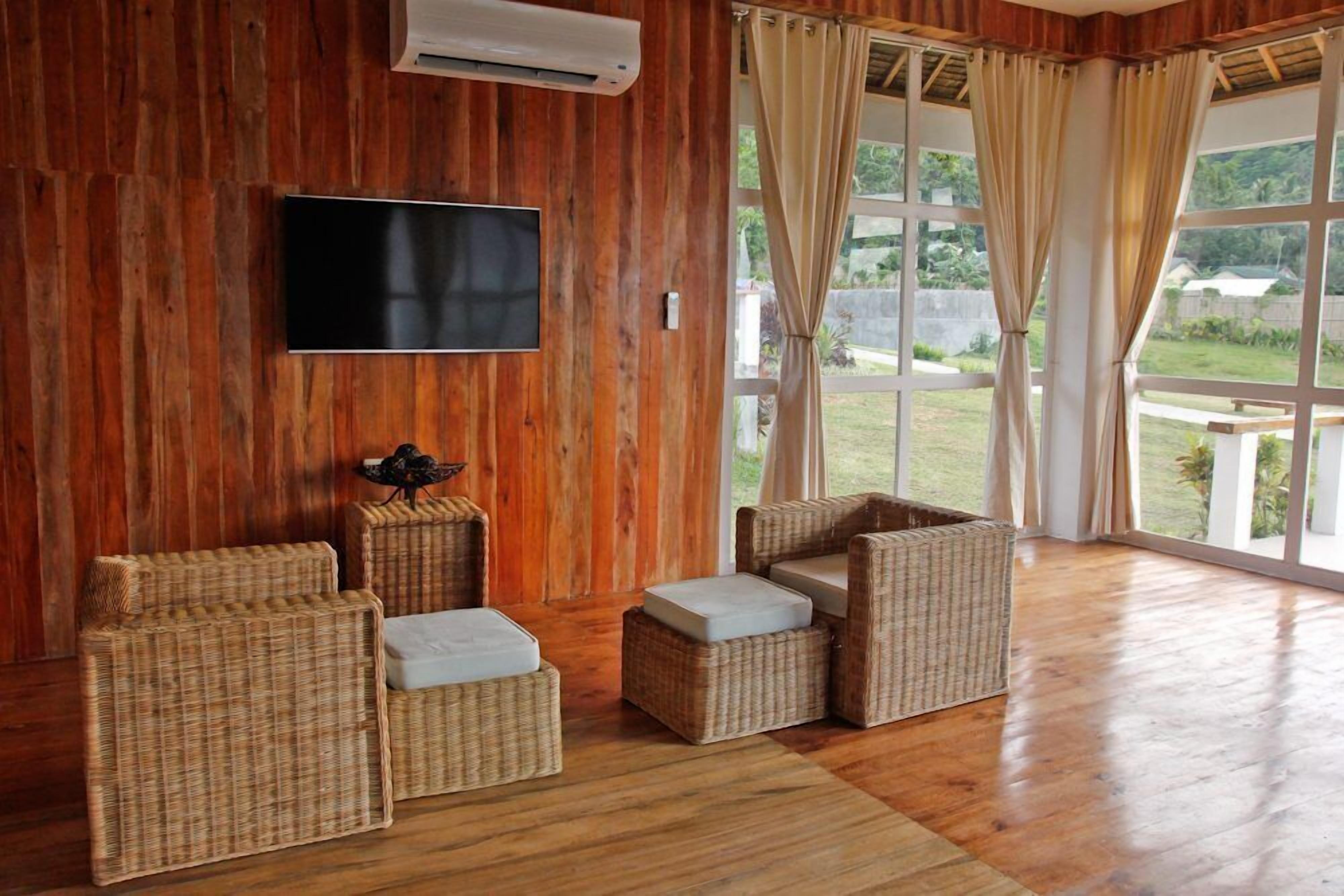 standard villa | living room | flat-screen tv