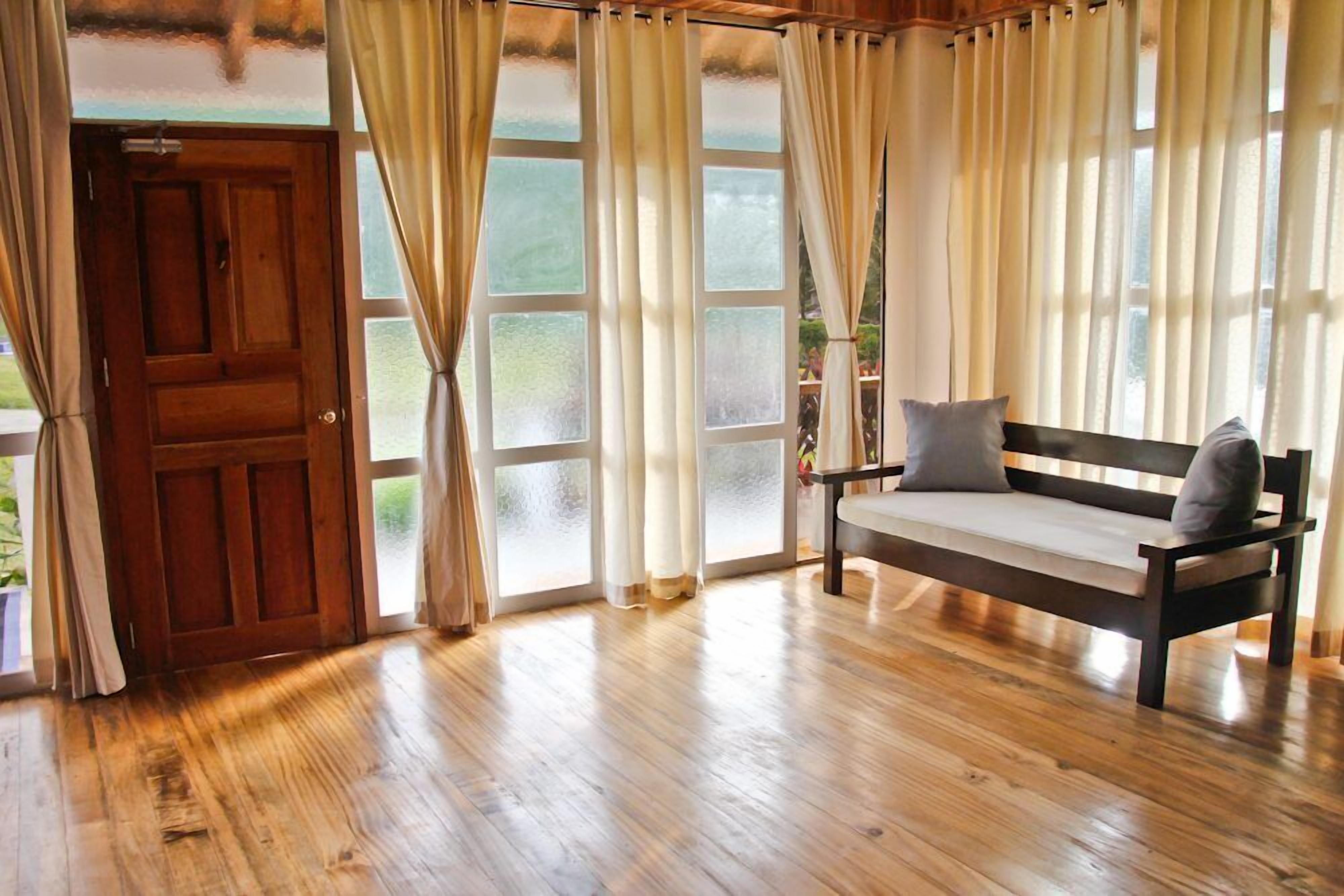 deluxe villa | living room | flat-screen tv