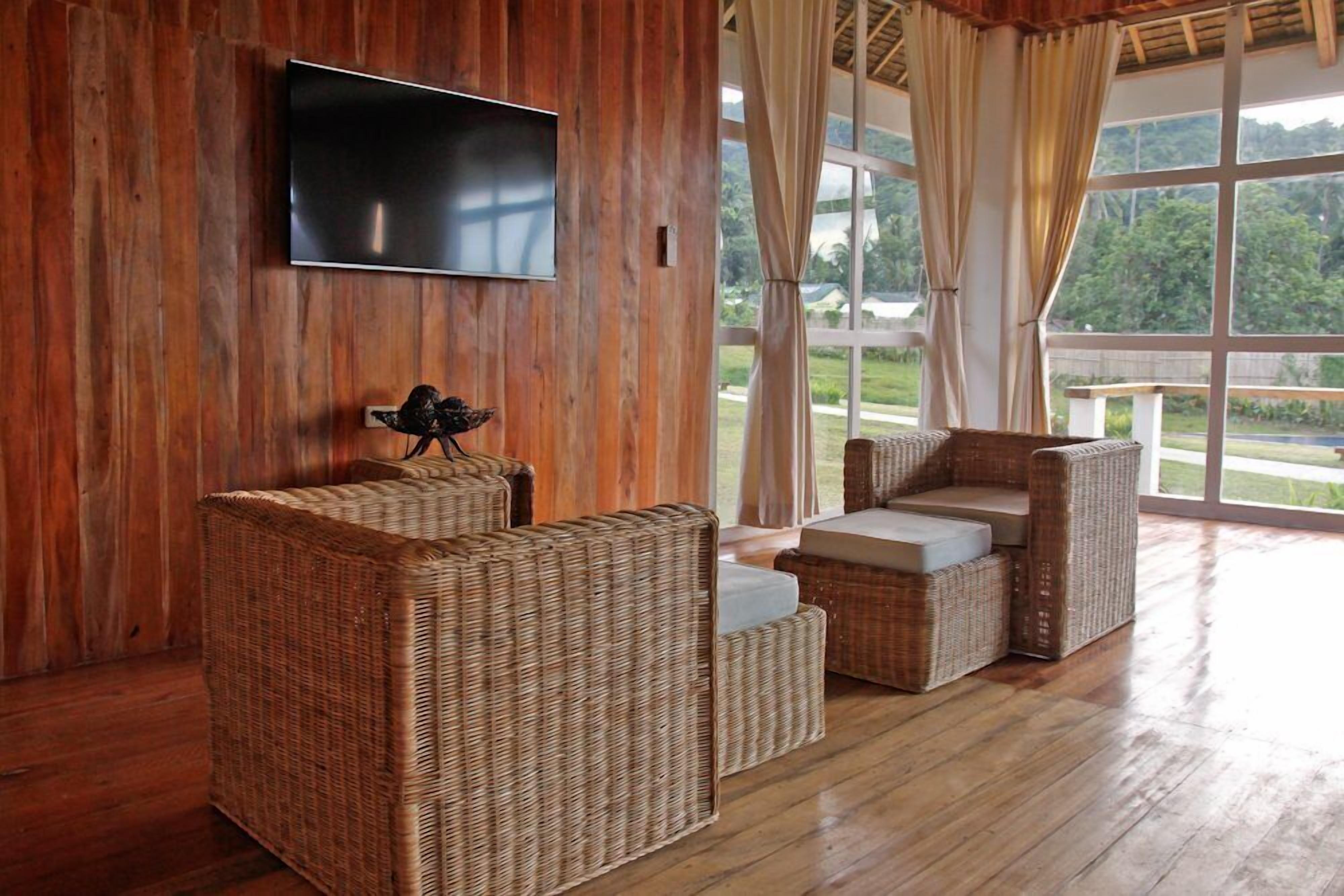 standard villa | living room | flat-screen tv