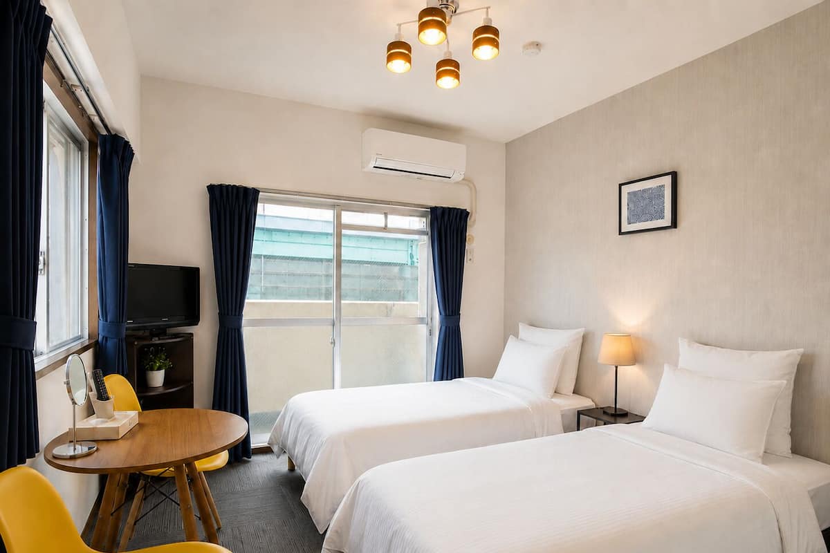 Apartment, 2 Twin Beds, Balcony, City View (402) | 1 bedroom, desk, iron/ironing board, free WiFi
