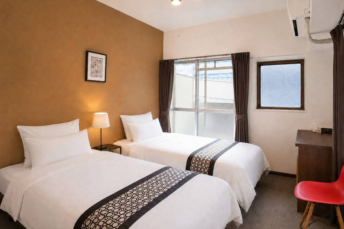Apartamento, 2 camas individuales, balcón, vistas a la ciudad (201) | 1 dormitorio, escritorio, tabla de planchar con plancha y wifi gratis