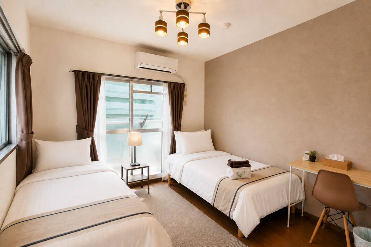 Apartamento, 2 camas individuales, balcón, vistas a la ciudad (602) | 1 dormitorio, escritorio, tabla de planchar con plancha y wifi gratis