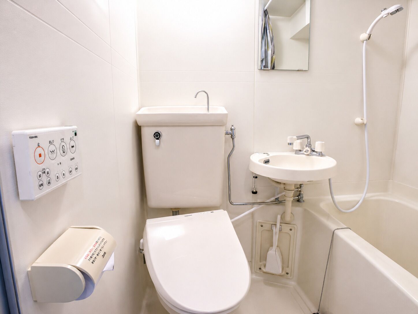 Combined shower/tub, free toiletries, hair dryer, slippers