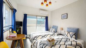 Apartment, 2 Twin Beds, Balcony, City View (402) | 1 bedroom, desk, iron/ironing board, free WiFi
