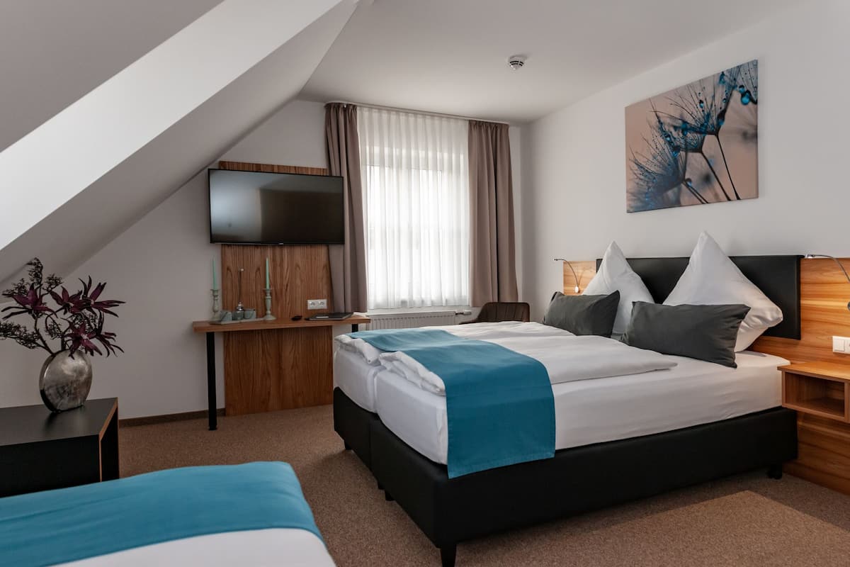 Dreibettzimmer