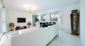 Suite, 2 Bedrooms (50 PY) | Living area | Flat-screen TV, heated floors