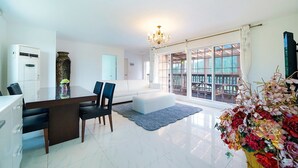 Suite, 2 Bedrooms (50 PY) | Living area | Flat-screen TV, heated floors