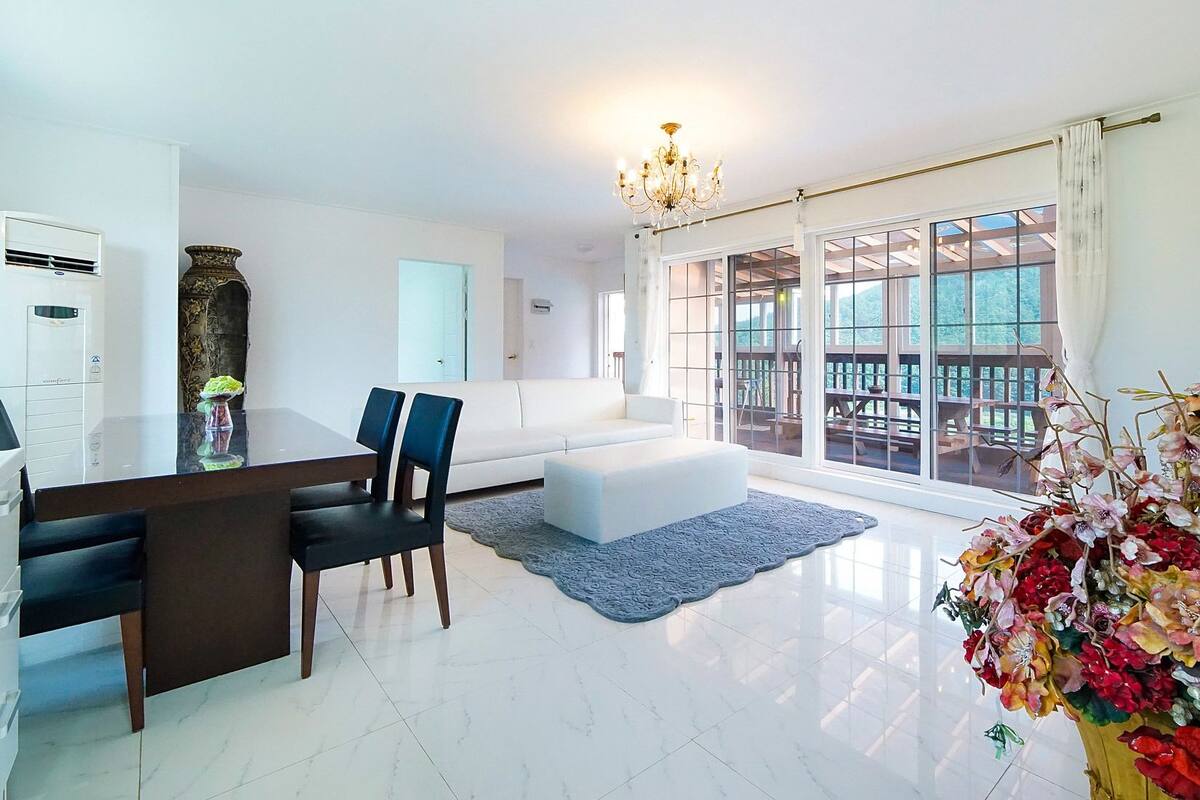 Suite, 2 Bedrooms (50 PY) | Living area | Flat-screen TV, heated floors