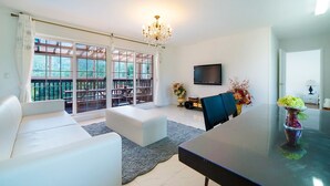 Suite, 2 Bedrooms (50 PY) | Living area | Flat-screen TV, heated floors