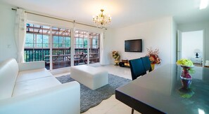 Suite, 2 Bedrooms (50 PY) | Living area | Flat-screen TV, heated floors - Yangyang Hillstar Pension (Yangyang)