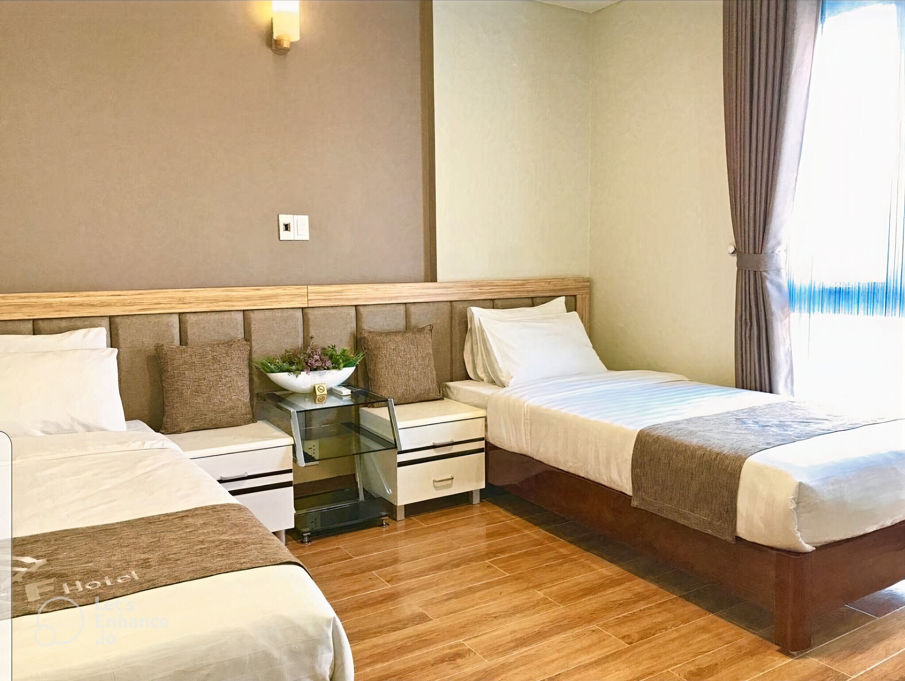 deluxe twin room | minibar, in-room safe, desk, laptop workspace