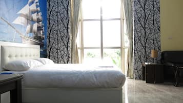 Room | Blackout drapes, soundproofing, free WiFi, bed sheets