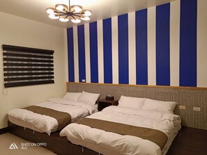 Quadruple Room | Down comforters, blackout drapes, free WiFi, bed sheets