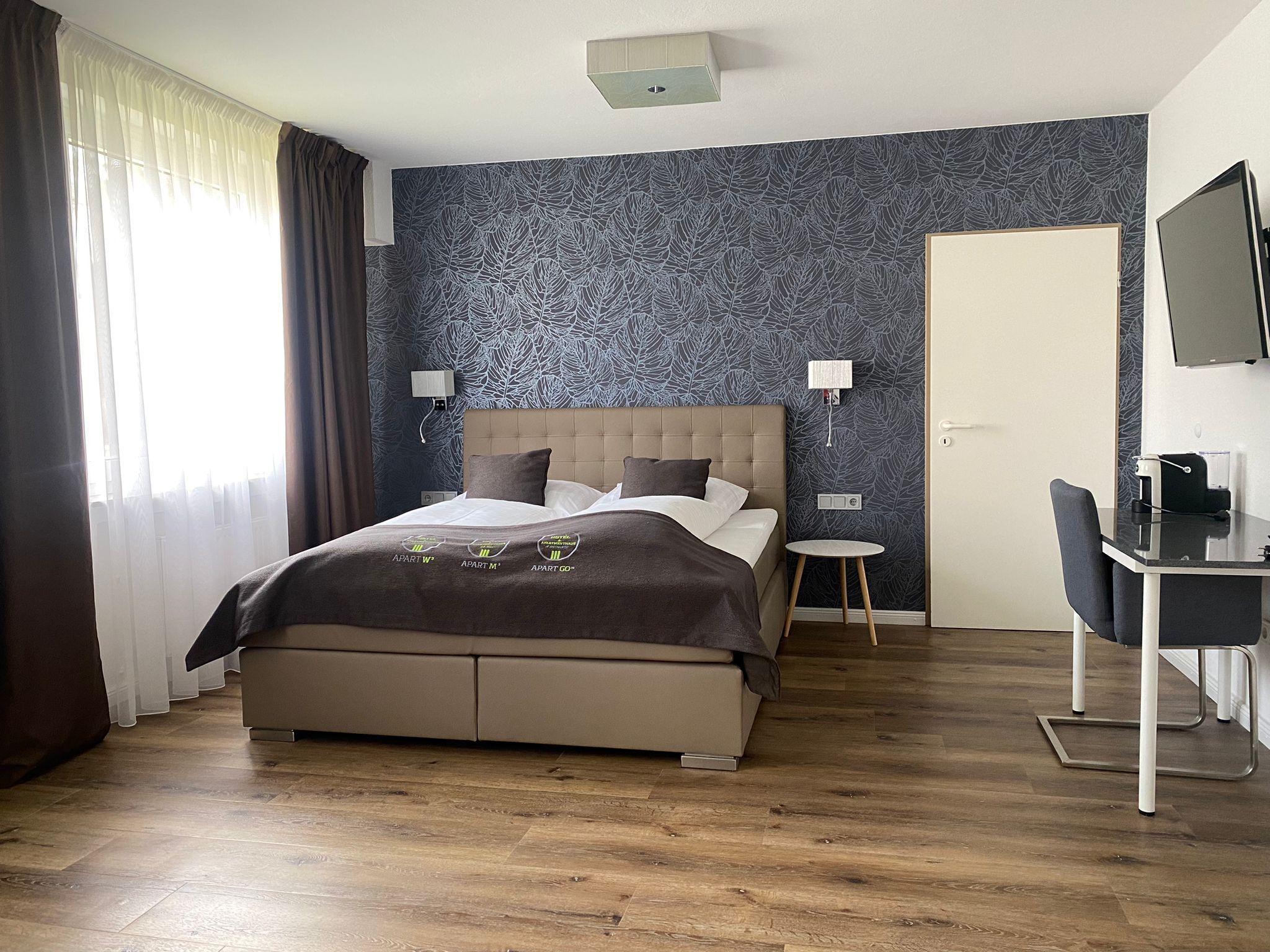 family studio suite | hypo-allergenic bedding, individually decorated, desk, laptop workspace