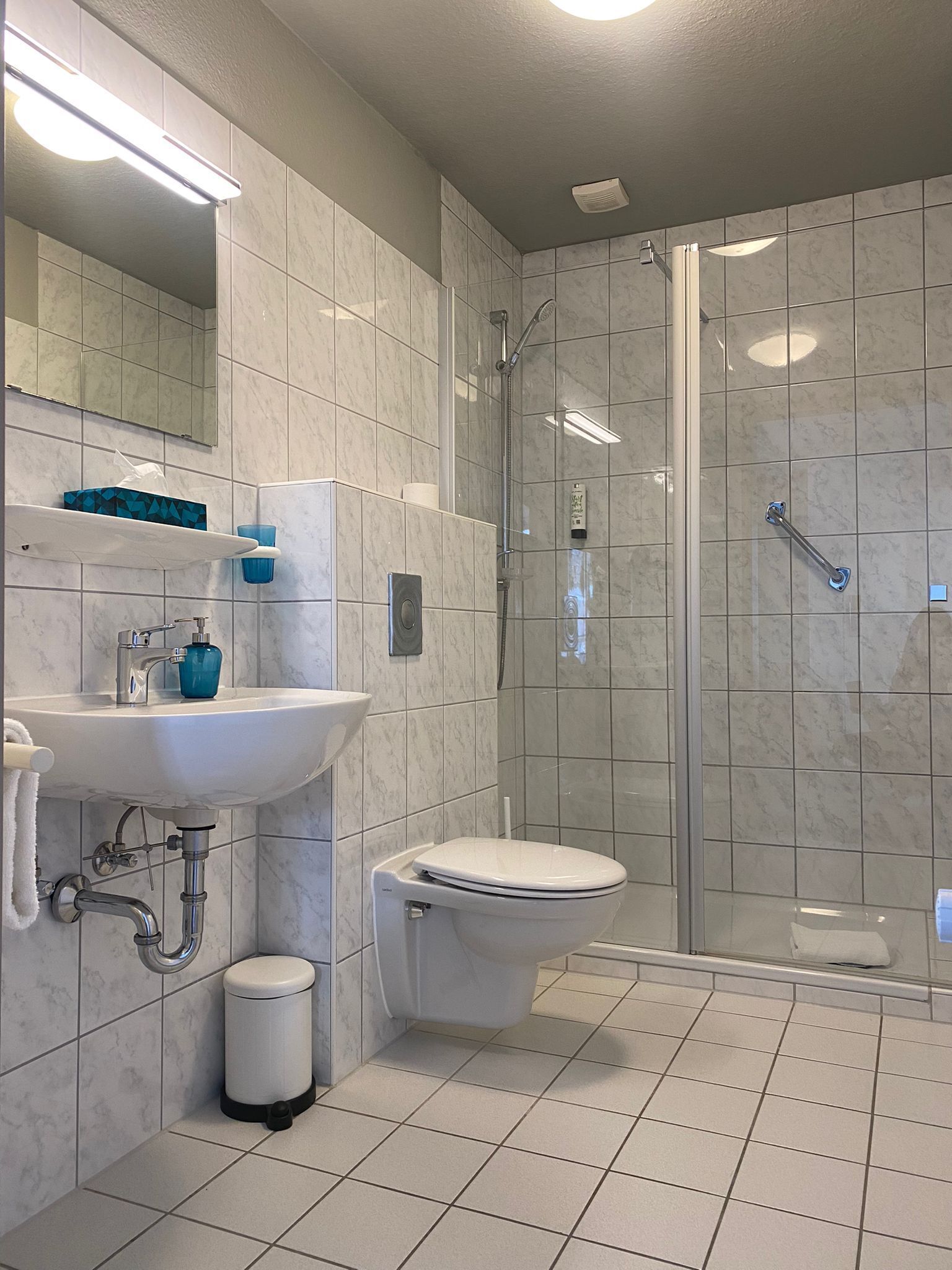 standard single room | bathroom | shower, hair dryer, towels, soap
