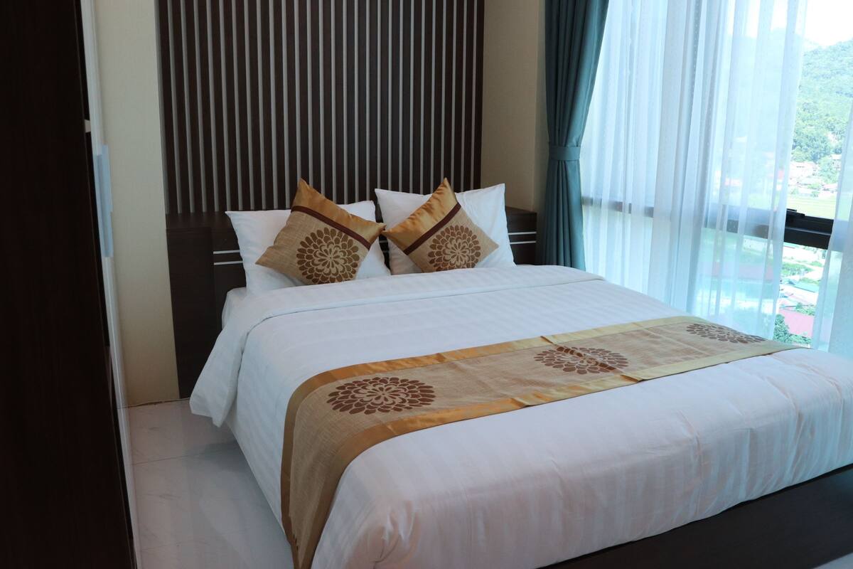 Premium bedding, memory-foam beds, minibar, desk
