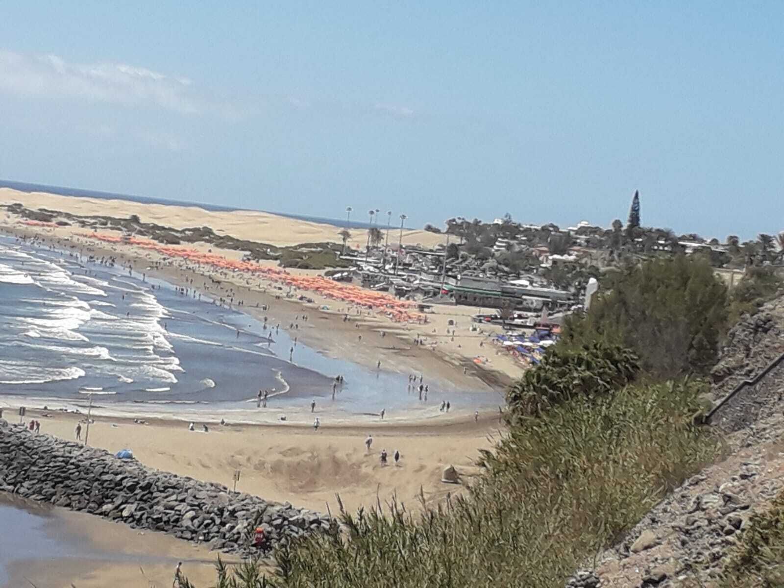 Nær stranden og strandhåndklær