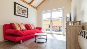 Ferienhaus (50qm-Bacchus-incl. 60EUR cleaning fee) | Wohnbereich | Flachbildfernseher