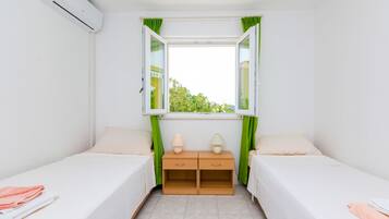 Twin Room, Patio, Garden View | Individually decorated, individually furnished, free WiFi, bed sheets