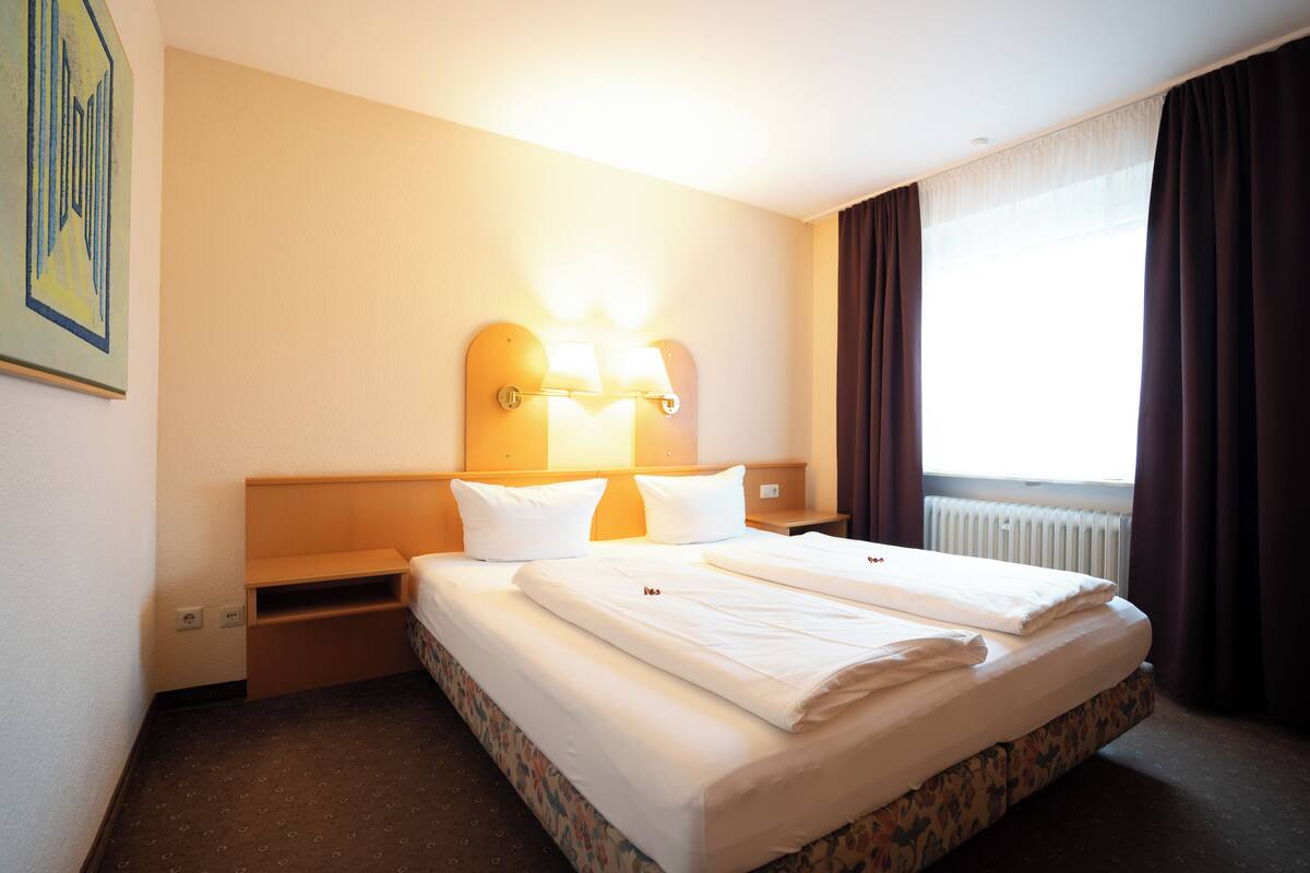 Desk, WiFi (free), bed sheets