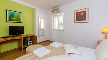 Deluxe Apartment, 1 Bedroom, City View | Laptop workspace, soundproofing, iron/ironing board, free WiFi