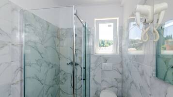 Studio, Balcony, City View | Bathroom | Shower, hair dryer, towels