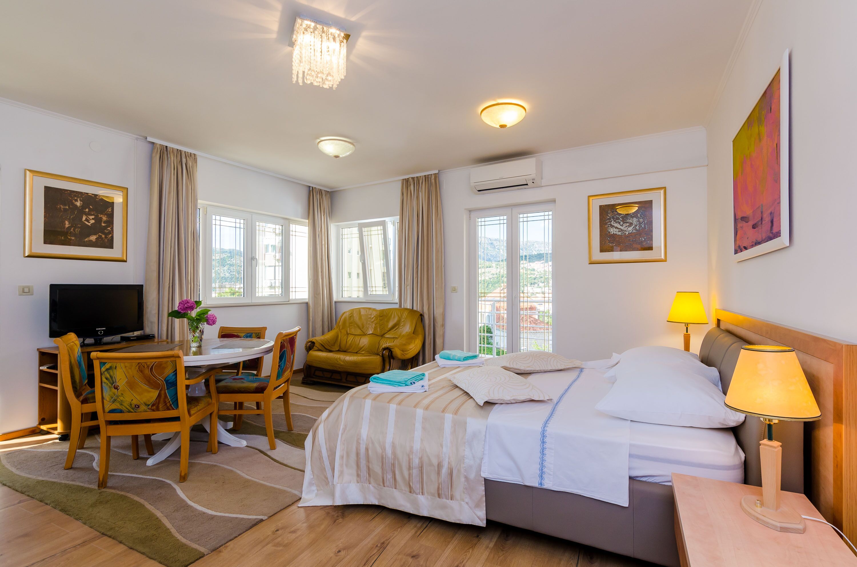 Deluxe Apartment, 1 Bedroom, City View | Living area | 20-inch plasma TV with satellite channels, TV