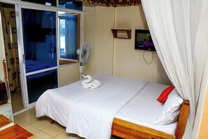 Quarto executivo | Roupas de cama premium, frigobar, escrivaninha