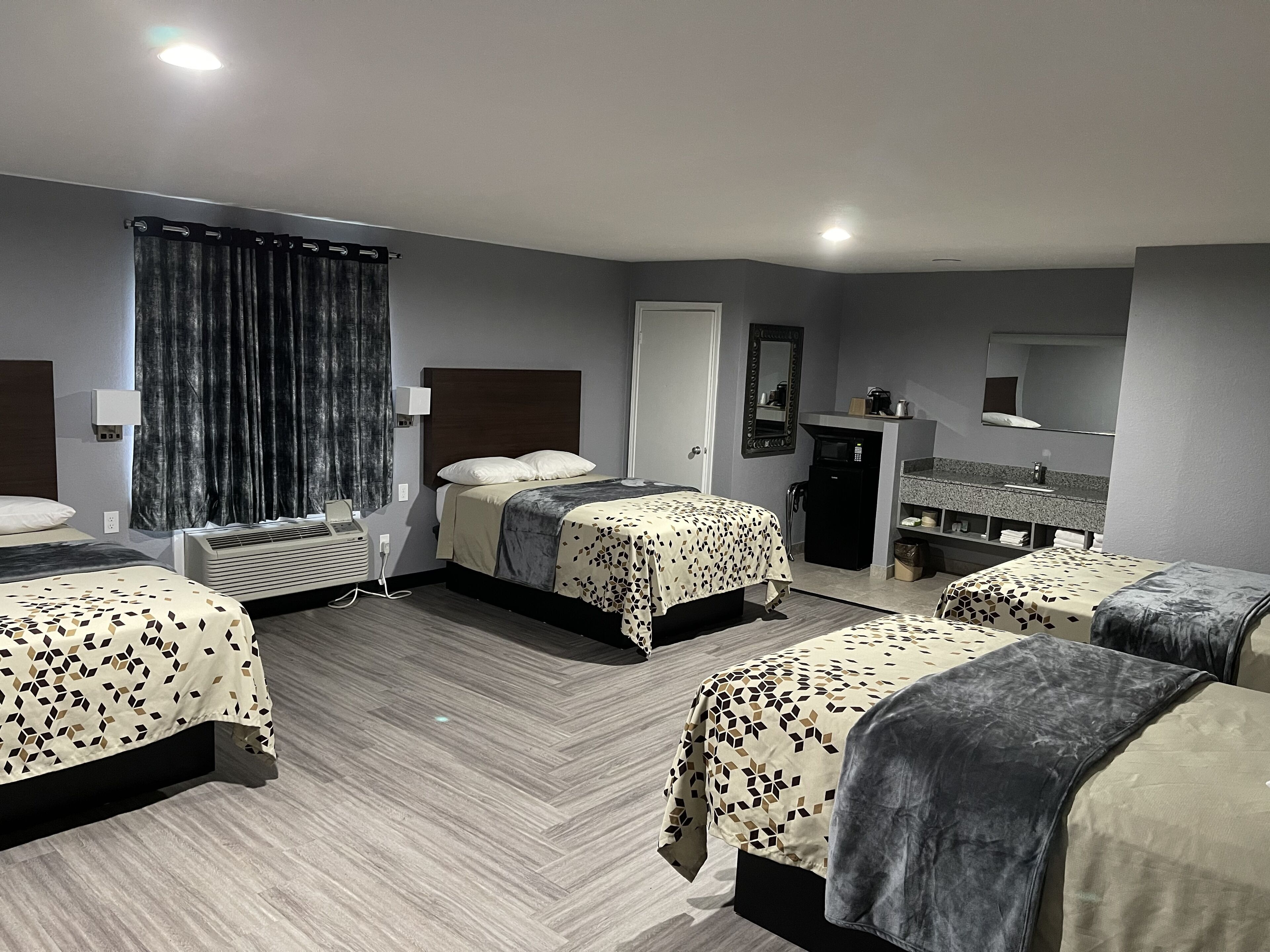 deluxe quadruple room, 4 bedrooms | blackout curtains, soundproofing, free wifi, bed sheets