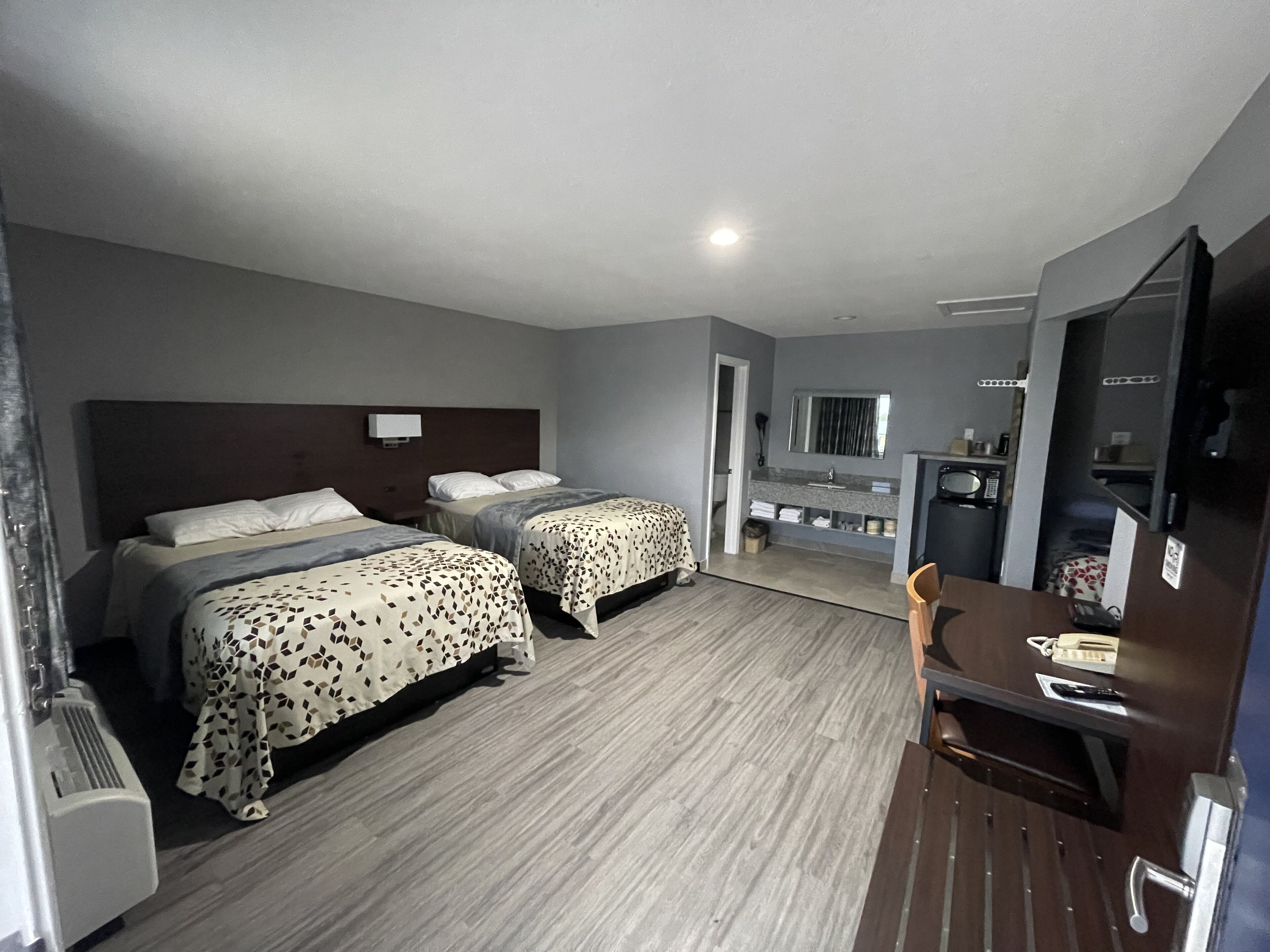 deluxe quadruple room, 4 bedrooms | blackout curtains, soundproofing, free wifi, bed sheets