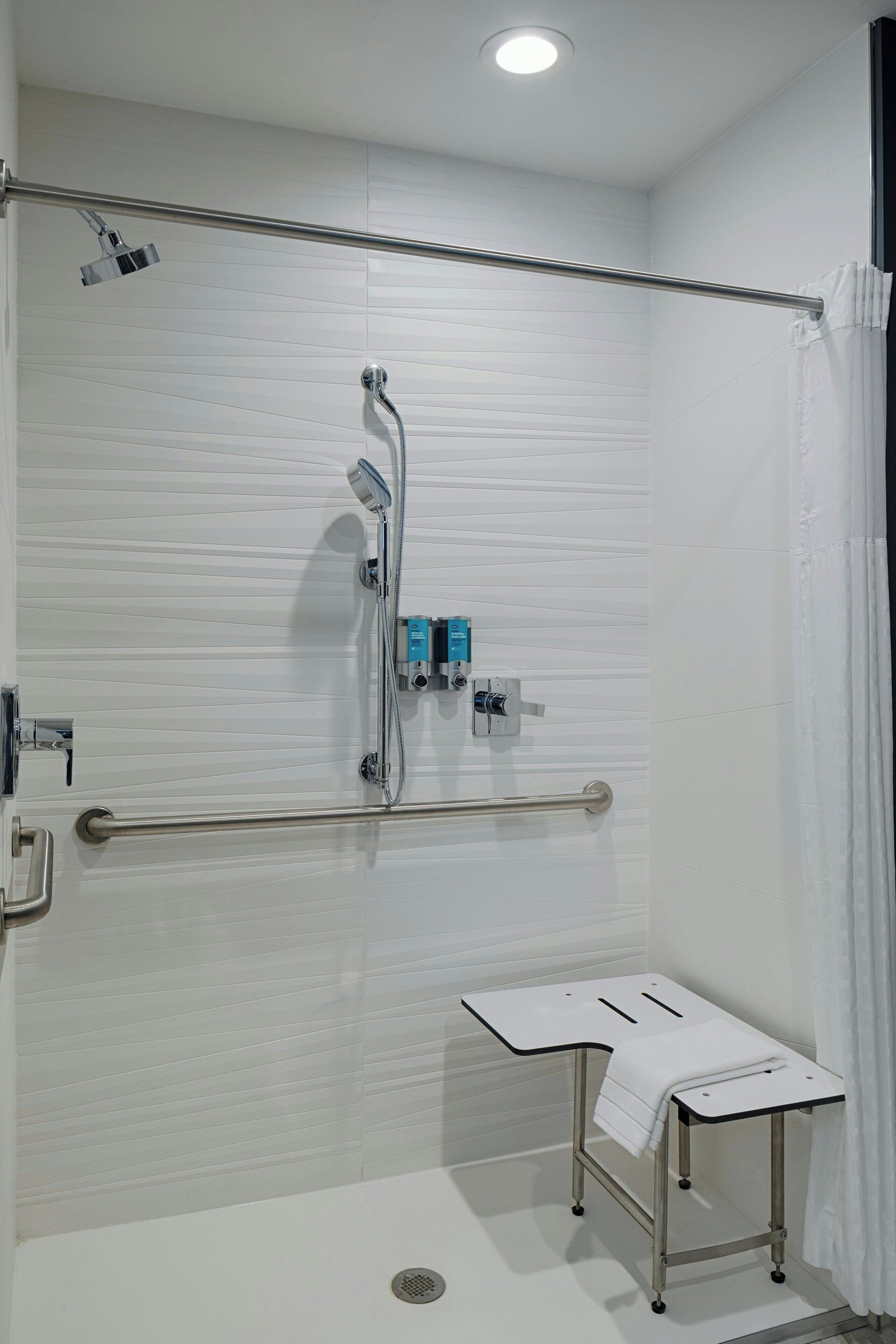 shower, hydromassage showerhead, free toiletries, hair dryer