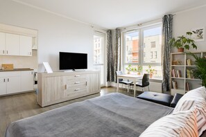 Design Apartment | Living area | Flat-screen TV