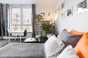 Design Apartment | Living area | Flat-screen TV