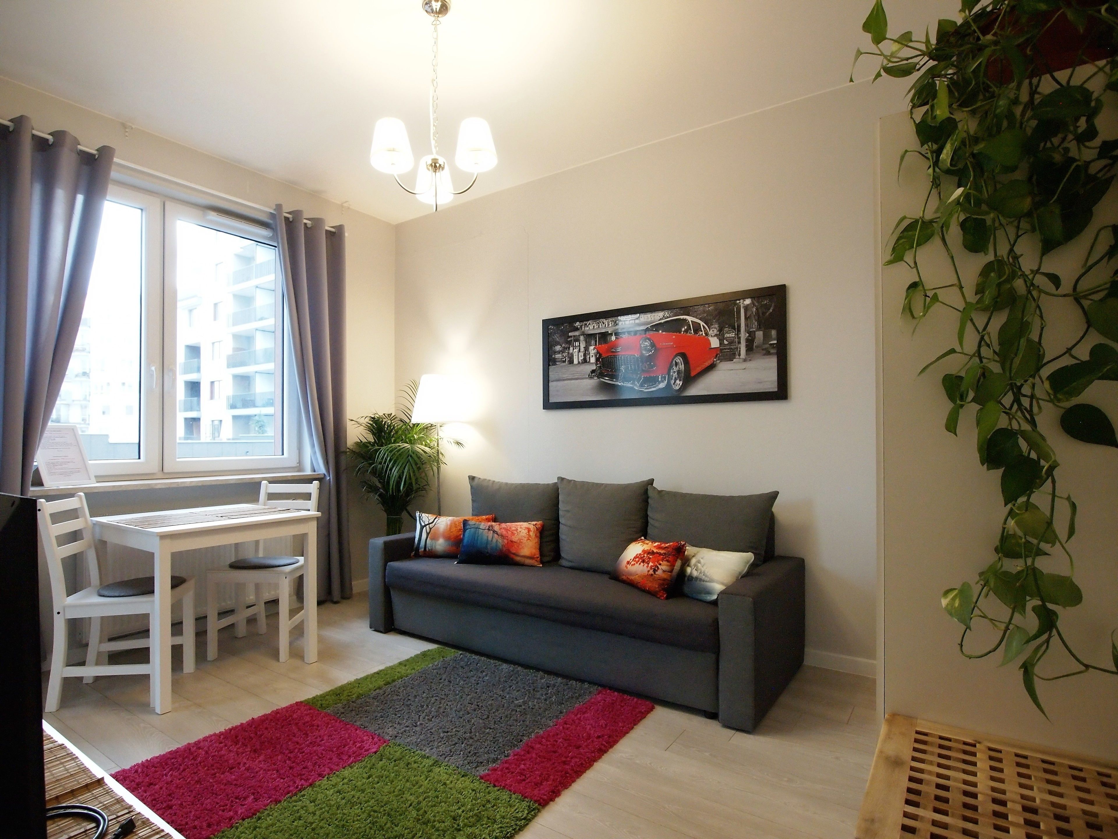 Comfort Apartment | Living area | 43-inch flat-screen TV with satellite channels, Smart TV