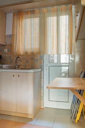 Design Apartment | Living area | 32-inch flat-screen TV with digital channels, Smart TV