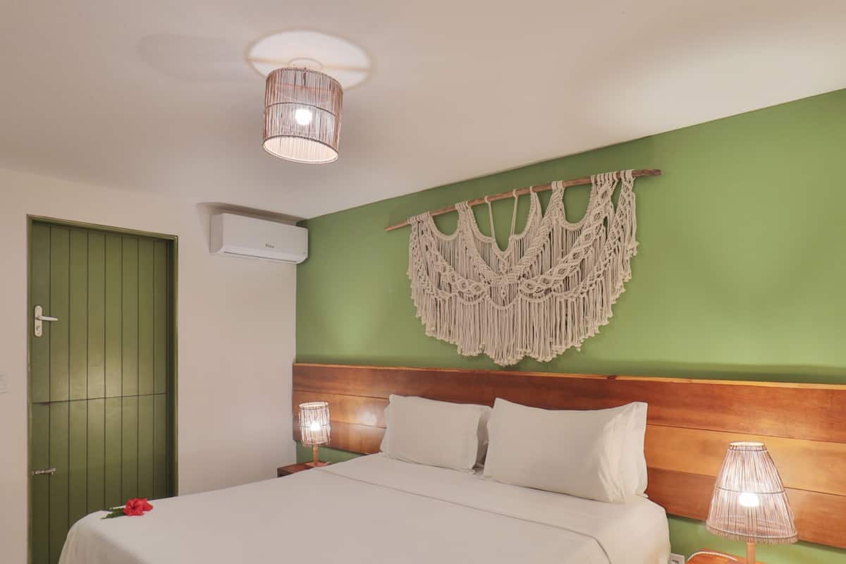 Suite Queen | Minibar, tabla de planchar con plancha, wifi gratis y ropa de cama