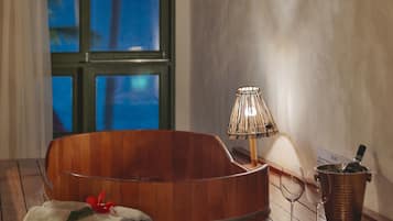 Suite Loft Vista Parcial Mar com Ofuro | Bañera de hidromasaje privada