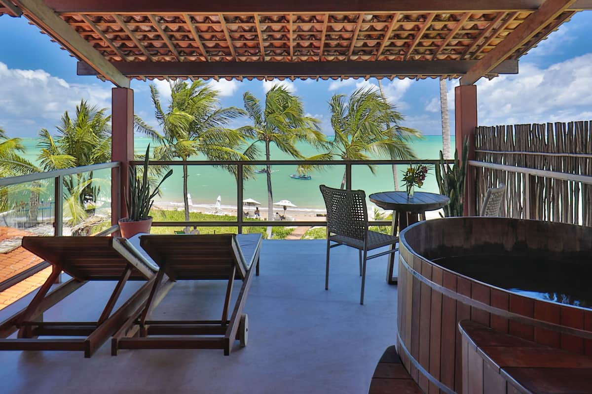 Suíte Vista Mar Deluxe Lages | 미니바, 다리미/다리미판, 무료 WiFi, 침대 시트