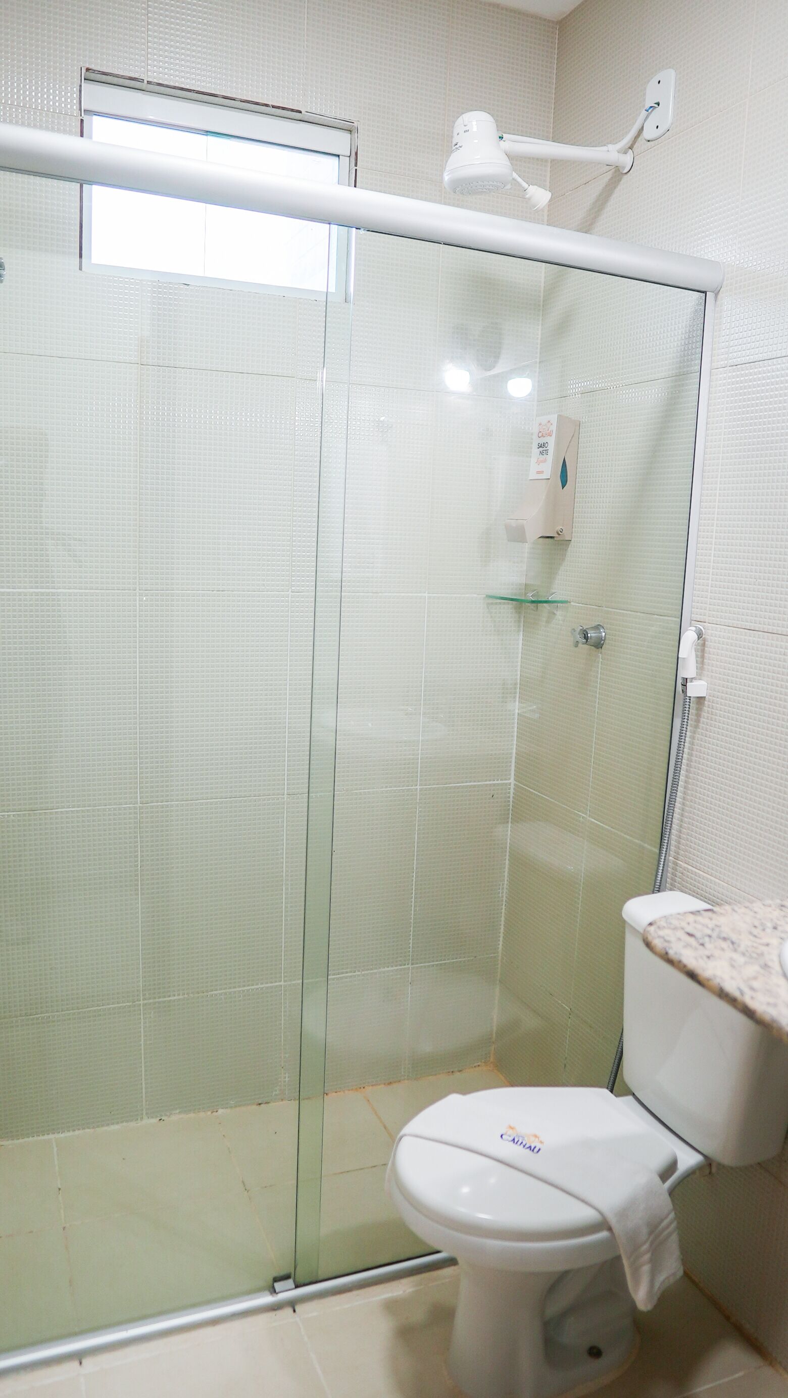 shower, towels, soap, toilet paper