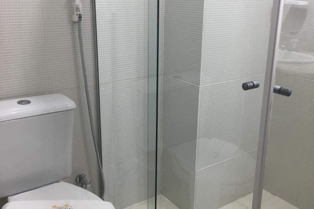 shower, towels, soap, toilet paper