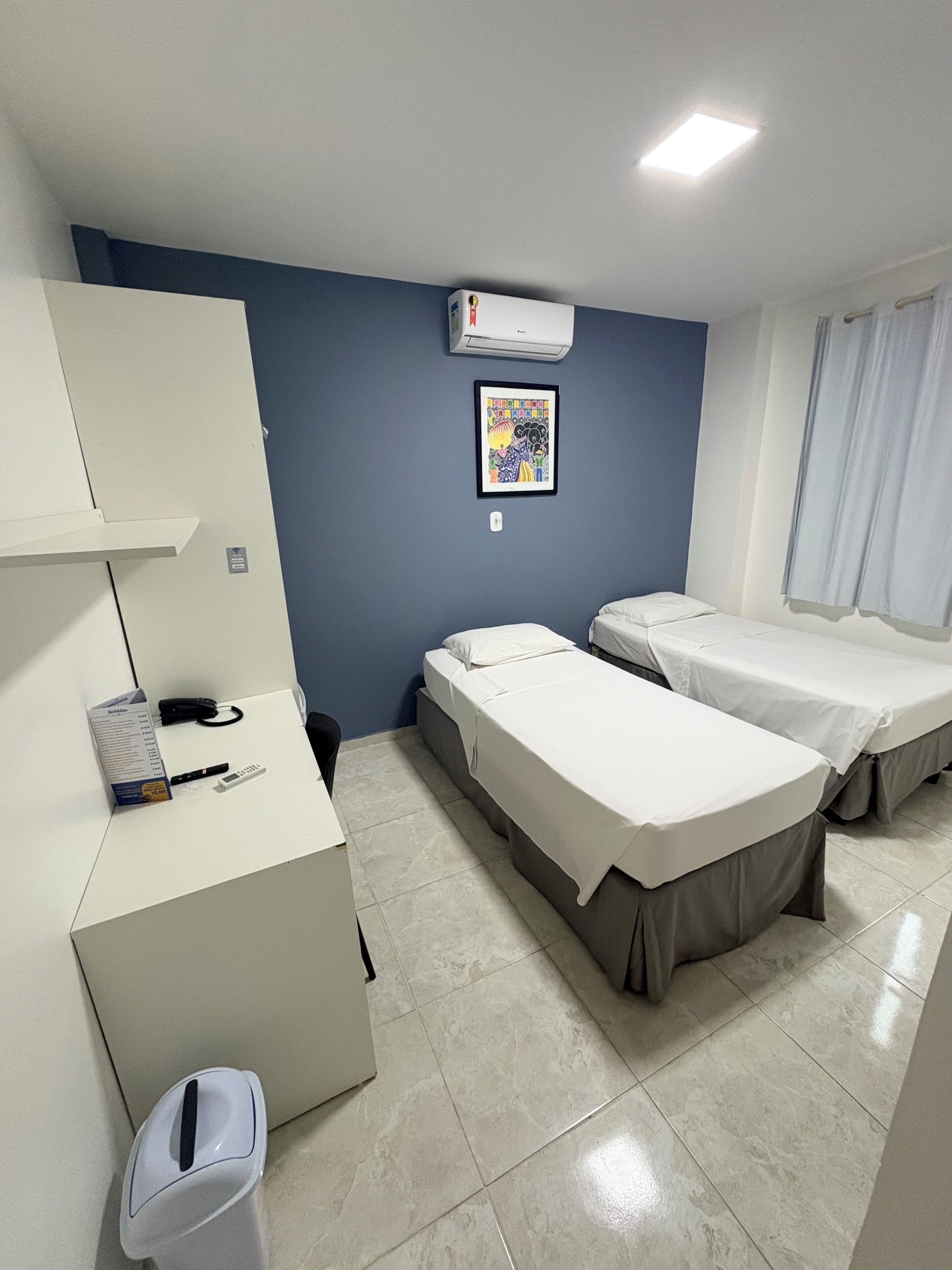 Executive Twin Room | Minibar, desk, laptop workspace, blackout curtains