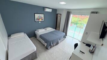 Family Room | Minibar, desk, laptop workspace, blackout drapes