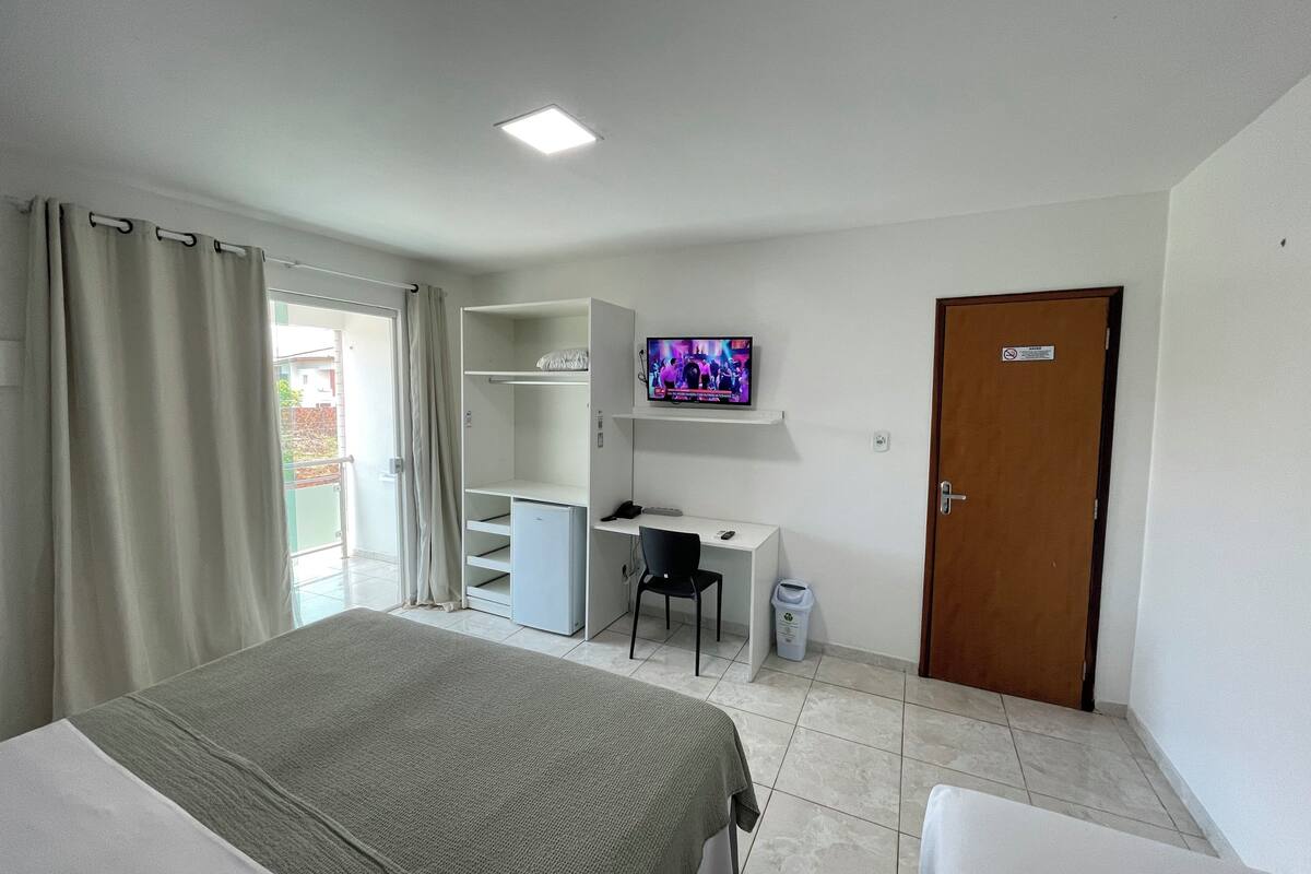 family room | 1 bedroom, minibar, desk, laptop workspace