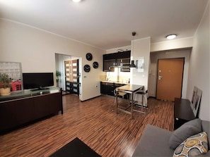 Comfort-Apartment | Wohnbereich | Fernseher