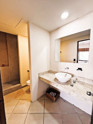 Deluxe Quadruple Room | Bathroom | Shower